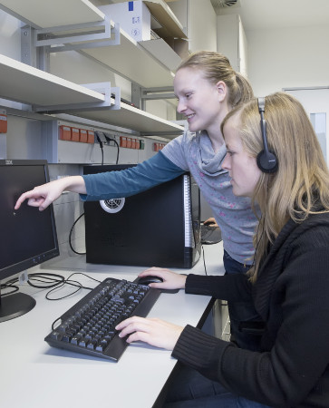 Researcher explaining an experiment to a participant